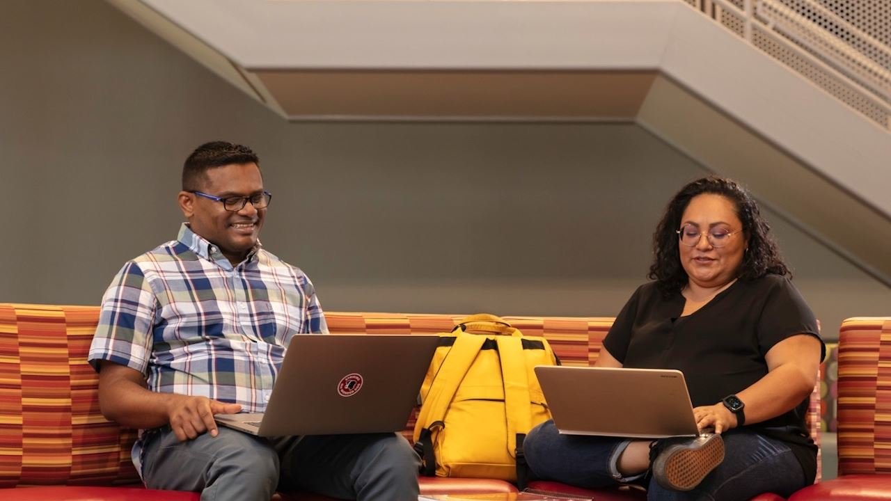 Raju Gangadhara, left, a graduate student in information technology at New Mexico State University, studies at Corbett Center Student Union with Ryan Hickman, a social work graduate student.