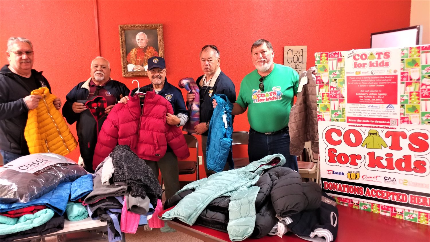 Knights of Columbus, left to right, Narciso Holguin, Rudy Calzada, Fred Flores and Leo Paz, collecting coats Nov. 21 at Holy Cross Catholic Church for delivery to Community Action Agency of Southern New Mexico for the 2022 Las Cruces Coats for Kids program.