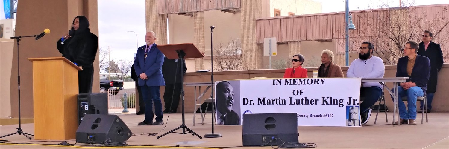 At the Doña Ana County NAACP rally at Plaza de Las Cruces Sunday afternoon, Jan. 15 honoring Martin Luther King Jr., who would have turned 94 that day, are, left to right, DAC NAACP President and NMSU Black Programs Acting Director Bobbie Green, Ph.D.; Doña Ana County Commissioner Shannon Reynolds; League of Women Voters of Southern New Mexico Co-President Eileen VanWie; Rev. Carolyn Wilkins; NM CAFé Community Organizer Daniel Sanchez; state Rep. Nathan Small, D-Doña Ana; and Mayor Ken Miyagishima (standing).
