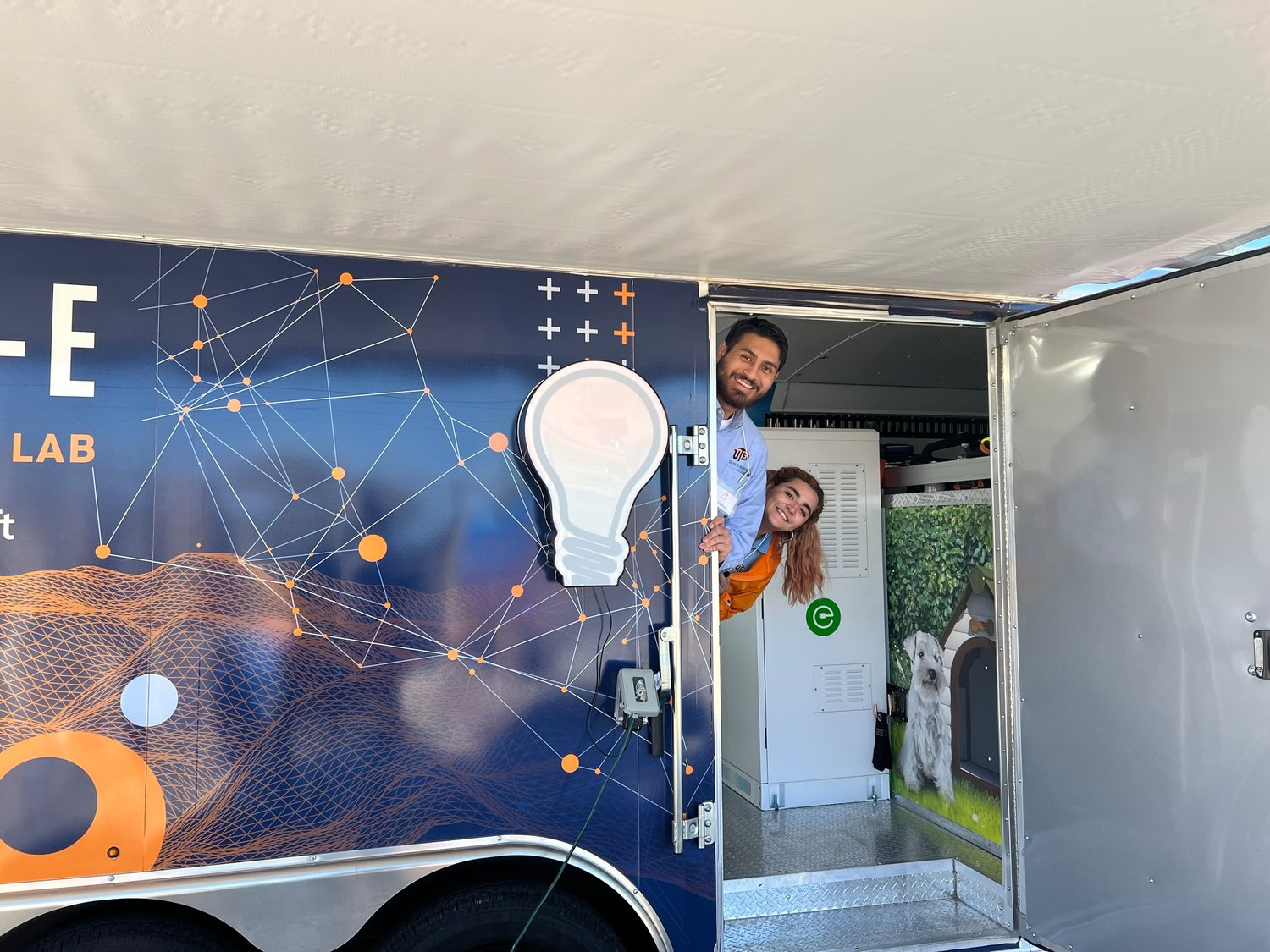 Austin Zambrano and Fatima Orpeneda man the mobile Discover-E engineering and computing lab created by UTEP to take to community events and schools for folks to learn about the nature of power.