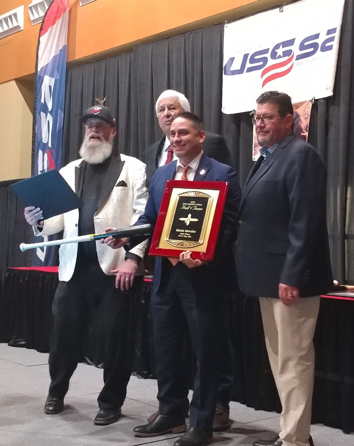 Lt Gov. Howie Morales was inducted into the New Mexico U.S. Specialty Sports Association Hall of Fame Feb. 25 in Las Cruces. Behind him are, left to right, Bert Frederick of Las Cruces, Ron Parra of Silver City and Kevin Naegele of Hobbs.