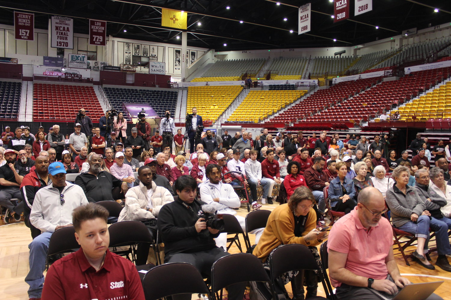 Aggie basketball fans crowded the Pan American Center’s parquet floor Sunday, March 26, to meet new men’s coach Jason Hooten.