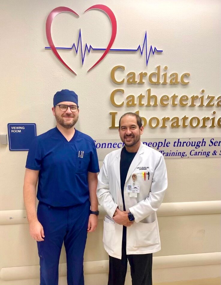 Electrophysiologist Steven Hamilton, MD, left, with Memorial Medical Center cardiologist Luis Colato, MD, after the successful completion of a procedure in MMC’s new EP Lab.