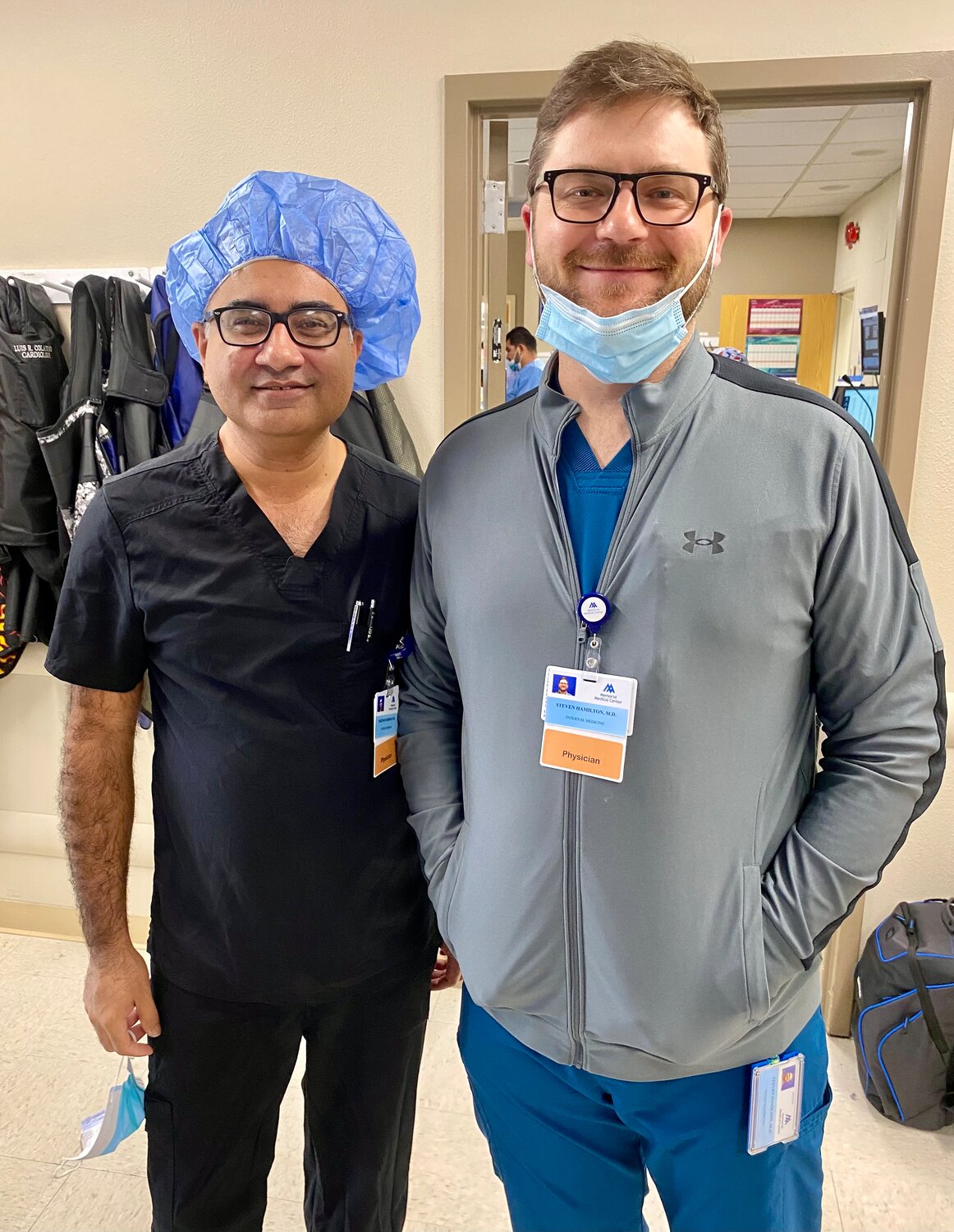 Electrophysiologist Steven Hamilton, MD, right, and Memorial Medical Center Chief of Cardiology M. Rizwan Sardar, MD, after the successful completion of a procedure in MMC’s new EP Lab.