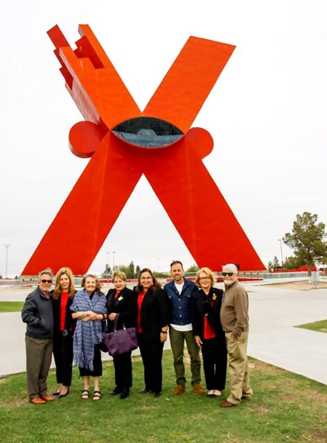 On July 22, “La Equis,” the historical landmark in Juarez, will be illuminated in teal to raise awareness of Fragile X Syndrome. Helping coordinate the event are Ciudad Juarez and Club Rotario Juarez Compestre, of which Mesilla’s Mary Lee Bailey Shelton, second from right, is a member. She and her husband Ted, far right, have a son, Shelton, who is affected by Fragile X.