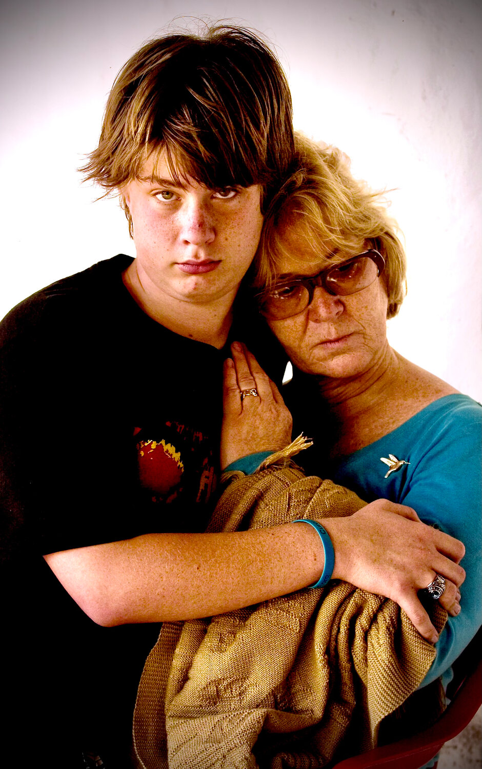 Spencer Shelton, with his mother, Mary Lee Bailey Shelton of Mesilla, has Fragile X Syndrome, a chromosomal disorder often associated with autism. On July 22, “La Equis” in Juarez, the giant X, will be illuminated in teal for Fragile X awareness.