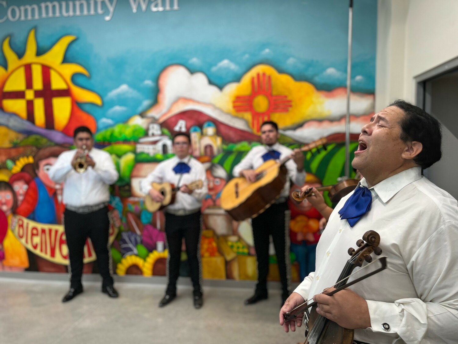 Mariachis perform in the lobby of the Casa de Peregrinos building Friday, Aug. 11, at the grand opening