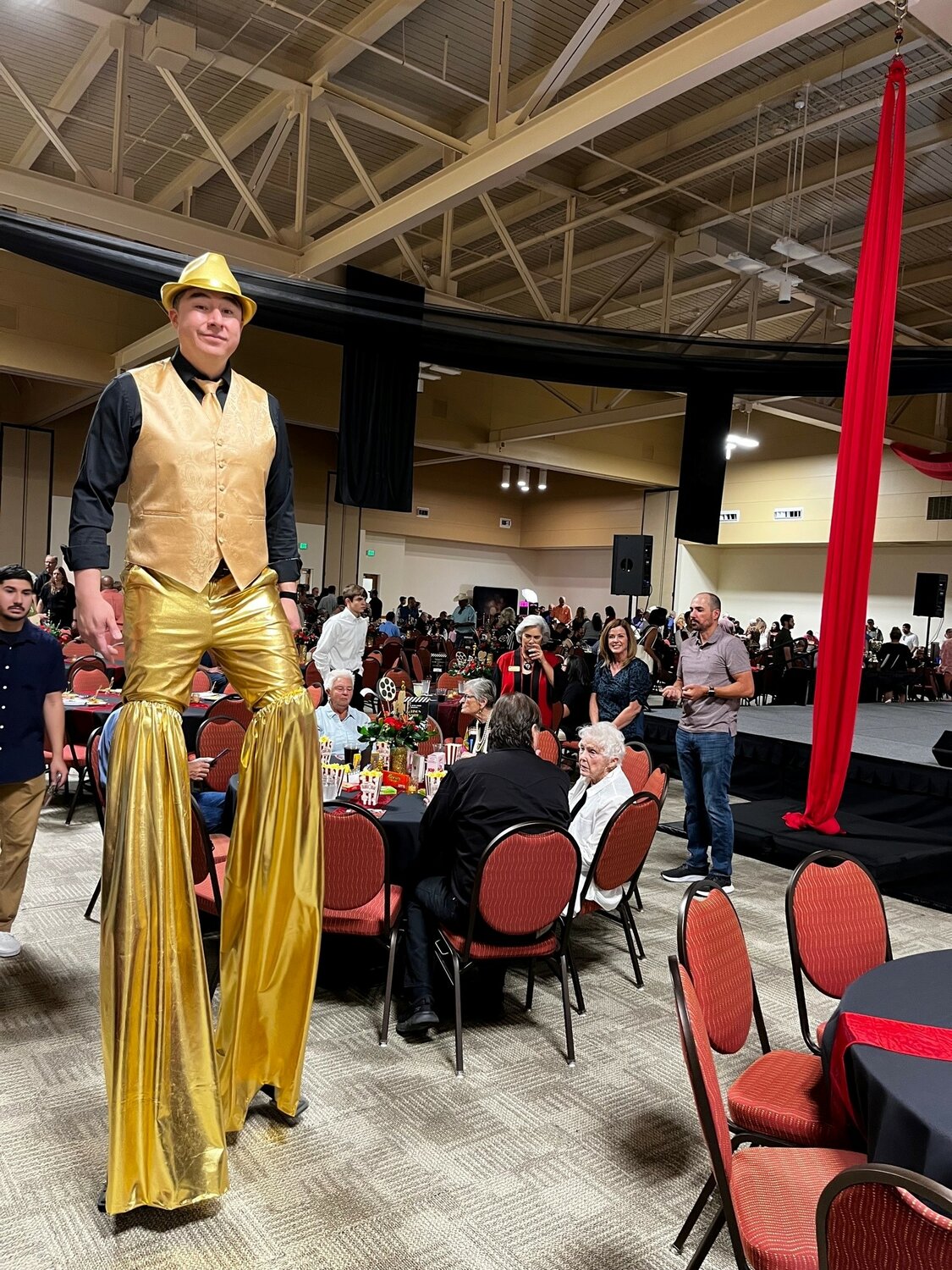 Guests at the Aug. 12 Men Who Cook fundraiser for Mesilla Valley Hospice were treated to all kinds of entertainment at the event, including stilt walkers.