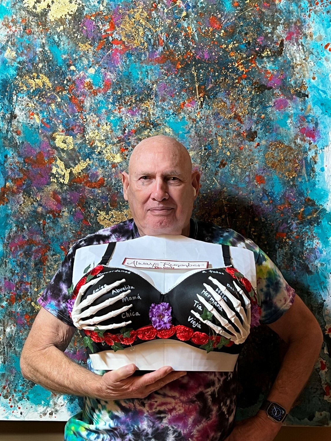 Alfred Hughey with 3D-printed bra “Skeleton Hands” and bra stand titled “Always Remember the Girls”