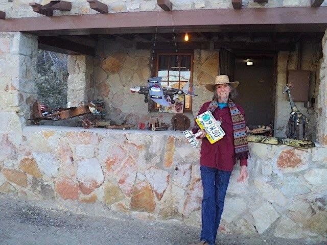 Artist Don Hallock shows his wares at one of the Damsite casitas during the 2023 Damsite Day in Sierra County.