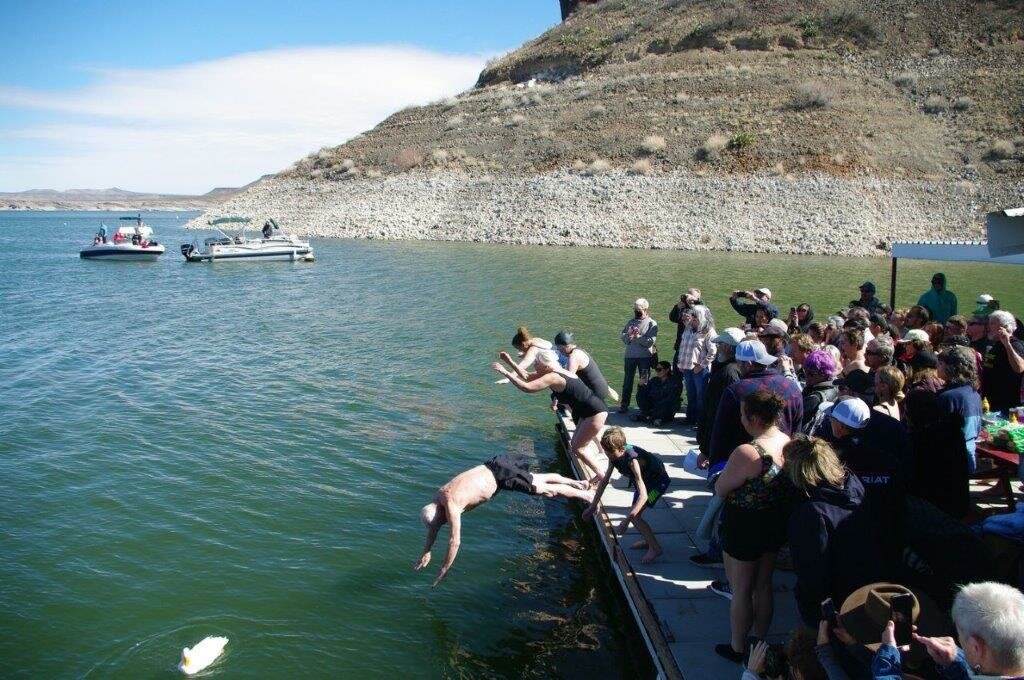 Polar Bear Plungers take to the lake in February 2023 during Elephant Butte Damsite Day.
