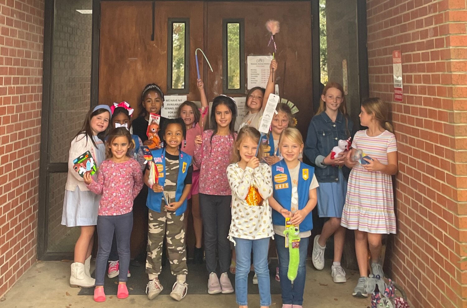 Girl Scouts donate to Webster Animal Shelter