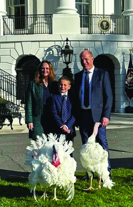 The Zimmerman Family with the 2024 Thanksgiving turkeys they raised, which were pardoned by President Joe Biden.  Pictured from left to right, Kara, Grant and John Zimmerman