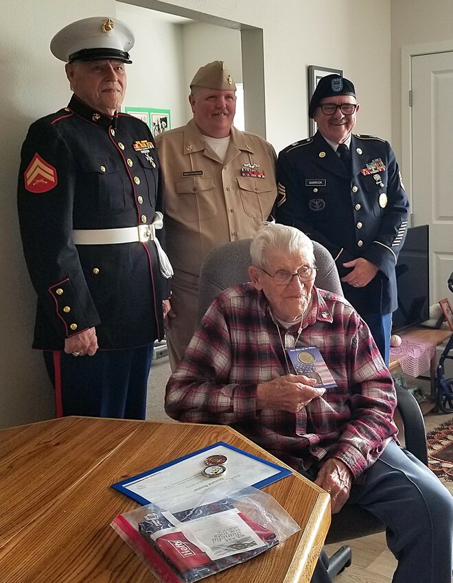 3 Members of the Red Wing American Legion and Beyond the Yellow Ribbon organization presented Don Reese with a certificate, pin, coins and patriotic pillowcase on Don's 100th birthday, September 15th.