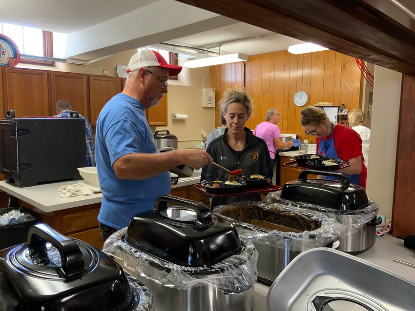 Dishing up the lutefisk carry out dinners