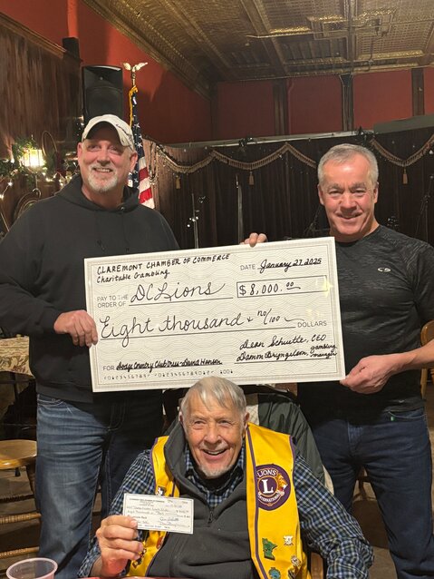 Damon Bryngelson, Claremont Chamber of Commerce gambling manager, David Hanson, and Dean Schuette, President and CEO of Claremont Chamber of Commerce, at the Jan. 27 Dodge Center Lion&rsquo;s Club. Hanson passed away on Feb. 28.