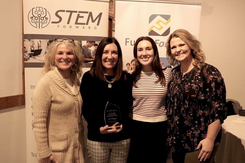 Left to right: Chris Heitman, Sara Mangan, Lindsey Mangan, and Courtney Bonnin