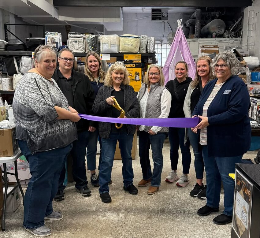 Representatives of Goodhue Chamber of Commerce members, J Hill Promotions, Peters Insurance, Goodhue School, Q Media Group, Voth Insurance, Great Rivers Insurance, Workout 24/7, and Lana Huemann Realtor/Trust Realty showed their support April 4th at their first ever ribbon cutting ceremony honoring the Barrel Hut.