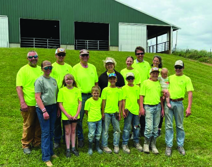 Combined farm families including Chris & Tony's parents Dave & Mary Jo.  Back row left to right: Chris, J.J., Dave, Mary Jo, Eleanor, Tony, Carrie.  Front row left to right: Jenna, Josie, Glen, Michael, Phillip, Francis, Louise, Patrick