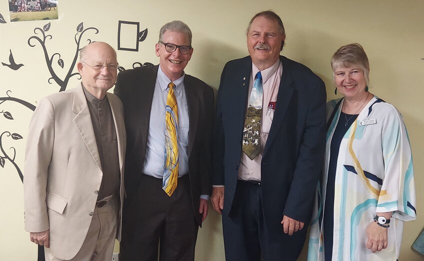 Pictured left to right: Rev. Rick Ormsby, Rev. Tony Fink, Pastor at Pine Island UMC, Pastor David Neil, and Rev. Michelle Hargrave