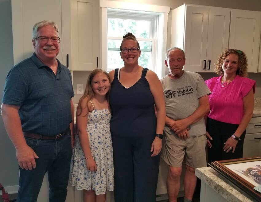 (L-R) Goodhue County Habitat for Humanity President, Bob Hawley, home owners Karlee and Nichole Brunkhorst, Construction Manager, Bob Bidon and Home Owner Services Manager, Angie Foss.