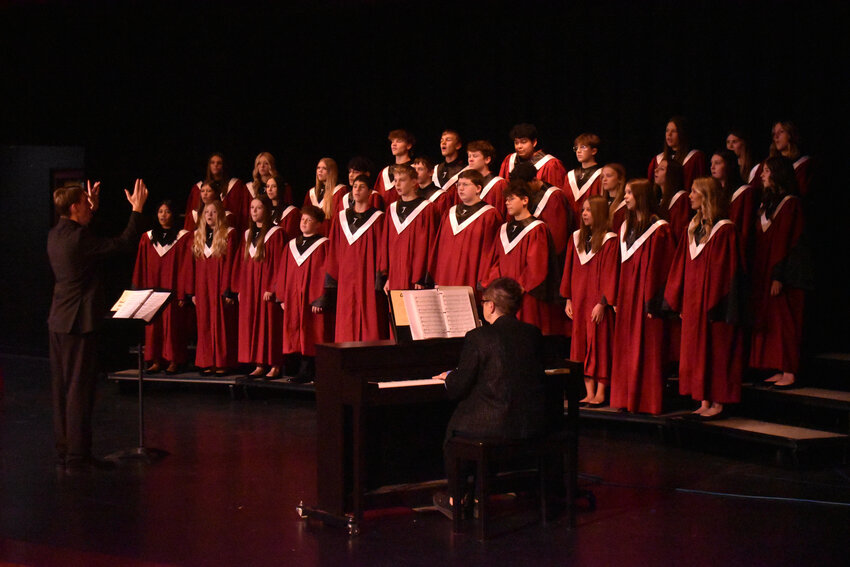 Andrew Wotherspoon directs the Mixed Choir at the Christmas concert.