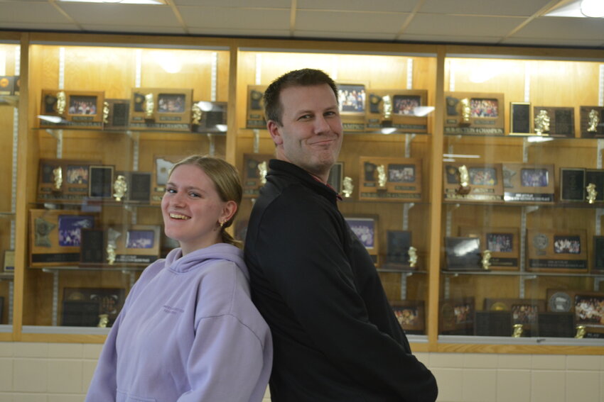 Abrielle and Mr. Neseth pose for a photo together