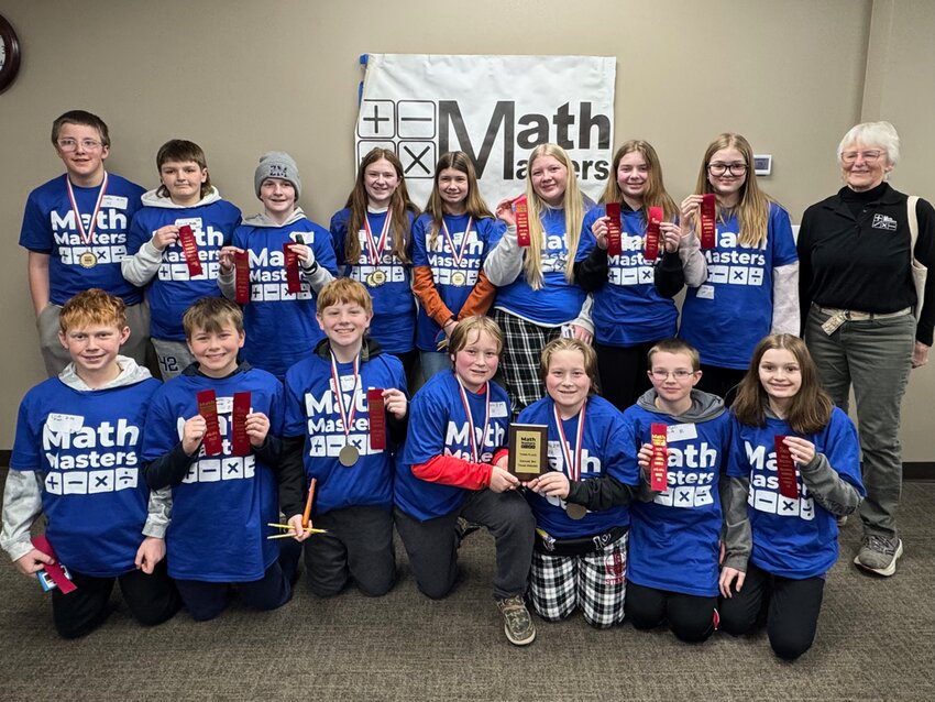 Front Row: Crue Olson, Emmett Weiland, Cohen Smith, Logan Trickey, Luke Trickey, Kyson Miller, Brooklyn Rude. Back Row: Rayfe Walker, Patrick Fruth, Jaxson Poncelet, Bristol Henderson, Arya Knapp, Arora Post, Payton Gosse, Lucy Young, Coach Denise Leedham
