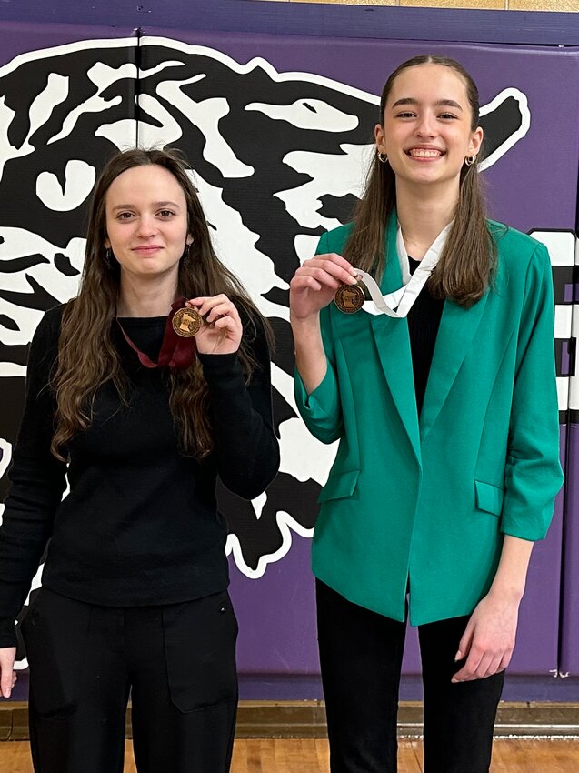 Madilyn Stehr (L), placed 6th in the Section 1A speech tournament and Mari Hanson qualified for state competition by placing 3rd.