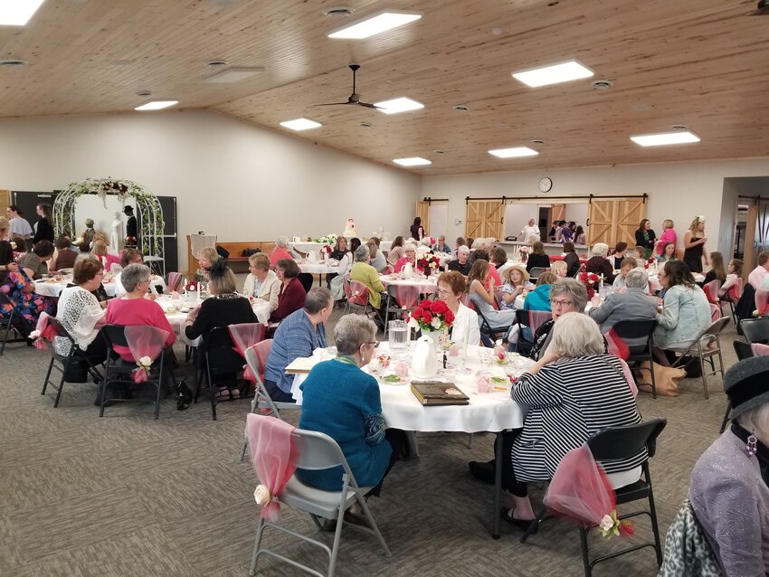 St. Luke's fellowship hall filled with guests attending the "Something Old, Something Brew" bridal-themed tea party.