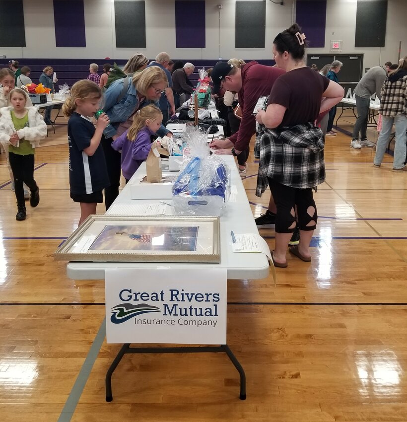 Bidding on the many Goodhue Education Foundation silent auction donations.