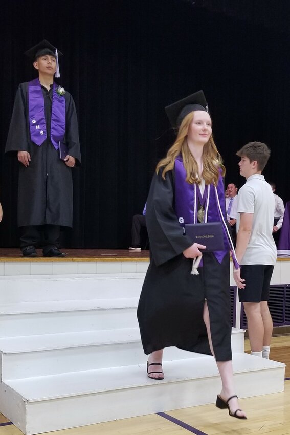 Salutatorian, Julia Evans.  Eyv Figueroa Hernandez in background.