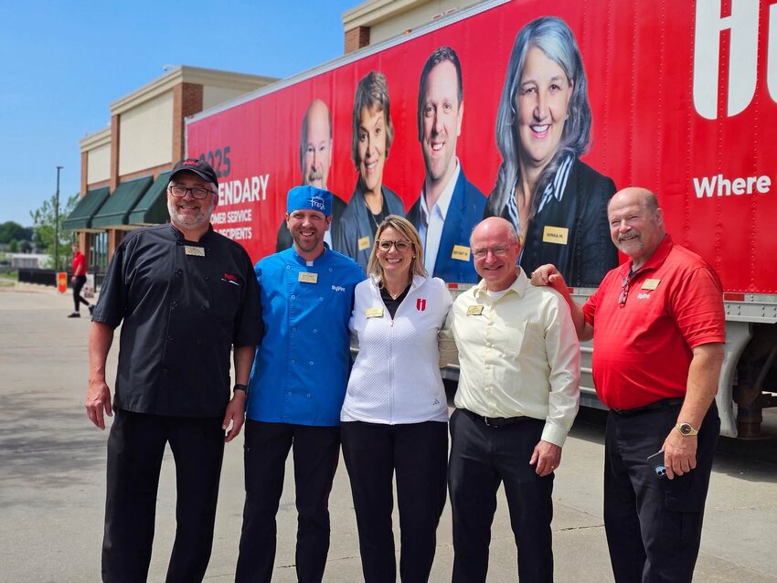 l to r: Virgil Stoskopf, deli manager Hy-Vee West, awarded 2024. Bryant Mayer, cake decorator for Hy-Vee West 2025 recipient. Audra Rinard, pharmacy mgr. awarded 2023. Joey Smith, general merchandise manager for Hy-Vee South is the recipient of the award in its inaugural year of 2023 and John Hazuka awarded in 2025.