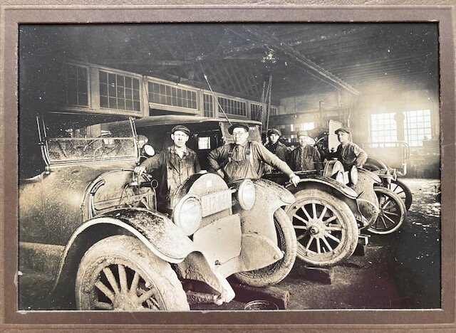 Stinson&rsquo;s Garage, left to right:  Bill Starman, Fred Bloomquist, Posie Robinson, Jake Bucher, Francis Tracey