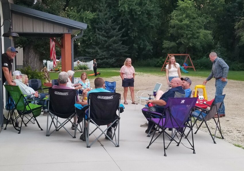 Goodhue Township neighbors gathered for a Night to Unite potluck supper and socializing in Jay and Teresa Voth's shed and yard on August 4th.