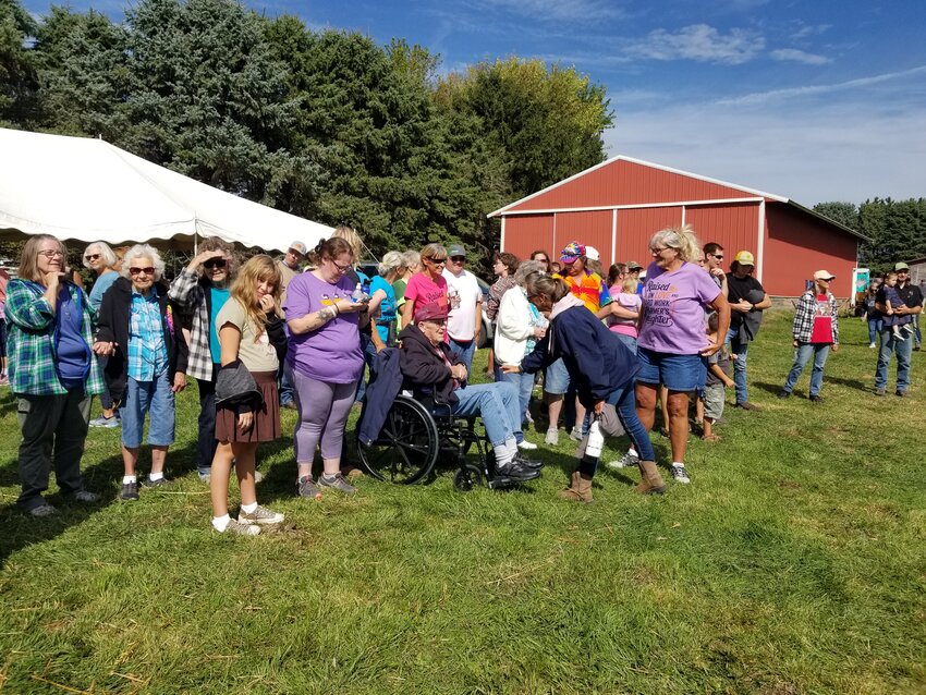 Family, friends and neighbors greeted Don Reese at his 100th birthday celebration on the farm.