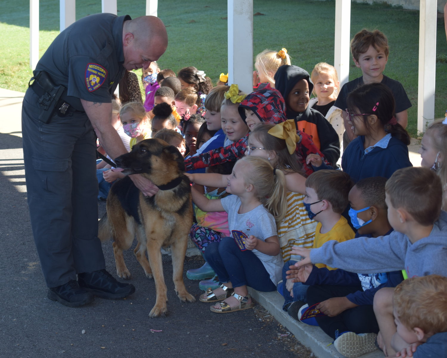 Interacting with K-9 during career week thrills kids