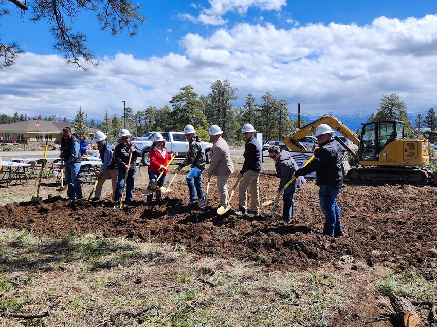 Representatives of Archuleta County break ground for the county’s new transit facility at Harman Park alongside architectural and construction personnel. For more on the center, see the related article on page A6.