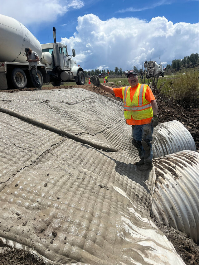 Archuleta County Road and Bridge staff member Pedro Caraveo works on the recently completed culvert replacement on North Pagosa Boulevard where it crosses Martinez Creek. Road and Bridge Manager Eric McRae commented that Caraveo is one the department’s “hardest working” employees. “[We would like] to give Pedro and all staff members special thanks this year for helping to improve on our team’s production and efficiency as we try to get our roads back up to a more acceptable standard,” McRae comments in a communication to The SUN.