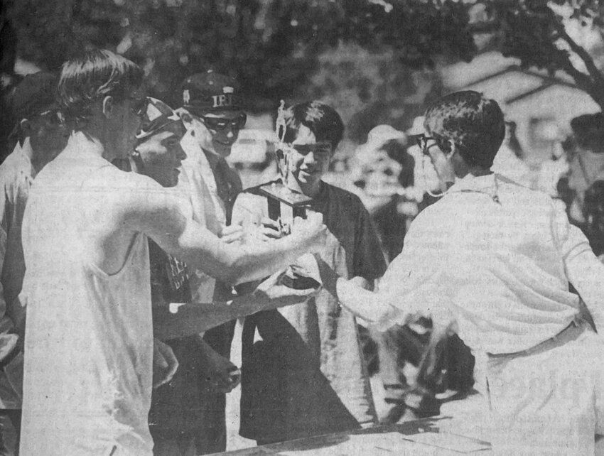 From the Sept. 9, 1993, Pagosa SUN — The Pagosa Pirates won the 10th annual Pagosa Invitational Cross-country Meet Saturday. Left to right, Toby Rohwer, Jeromi Kummell, Lenny Ecker and Frank O’Cana gladly accepted the team trophy after coach Shirley Cope announced Pagosa had won first place with a low score of 22 points.