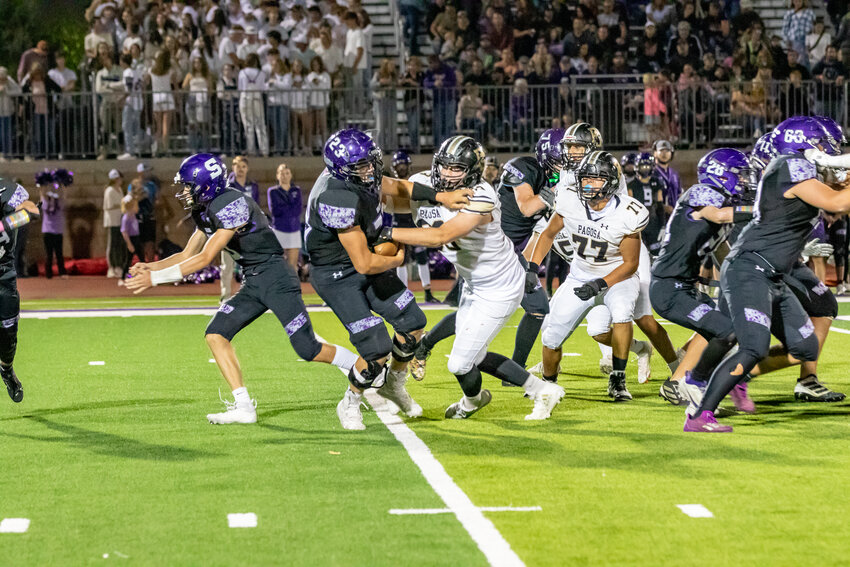 Pirates’ defensive linemen Aven Cole and Jesus Serratos break into the Spartans’ backfield disrupting the play. Cole led the Pirates in tackles on the night, recording nine solo tackles.