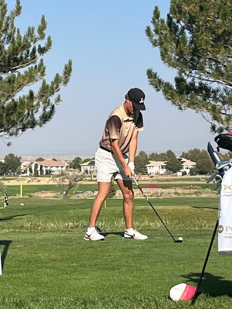 Pirate Johnathon Smith lines up a shot during the 3A state golf tournament. The tournament took place Monday and Tuesday in Pueblo, with Smith tying for 10th and earning all-state honors.