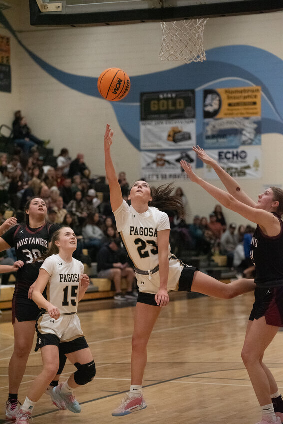 Lady Pirate Karsyn Shahan puts up a shot against the No. 26 Fort Morgan Mustangs in the opening rounds of the 4A state basketball tournament. As the seventh seed, the Lady Pirates hosted the action, beating the Mustangs 55-23.