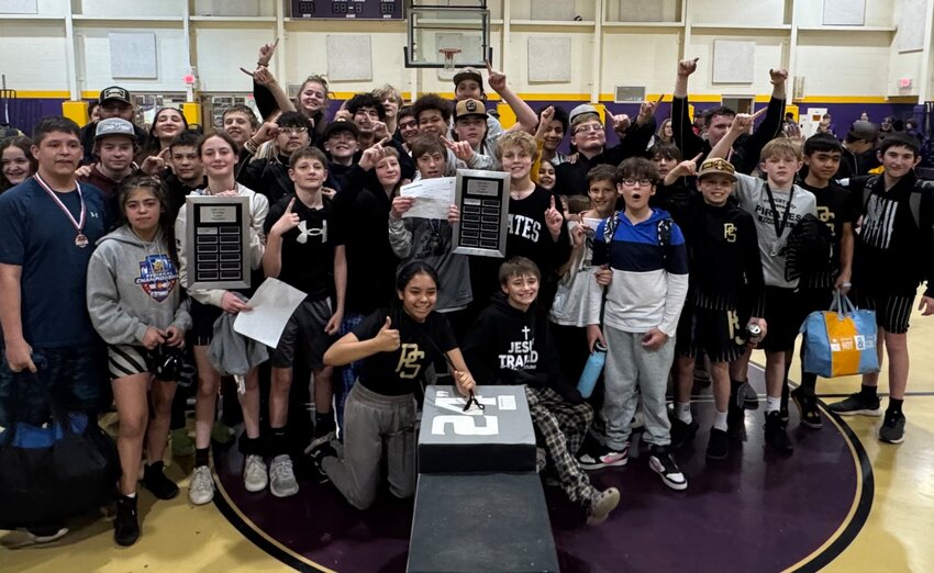 The Pagosa Springs Middle School wrestling team celebrates after winning the San Juan Basin League Championship Saturday, March 7, in Bayfield. The Pirates competed against Bayfield, Cortez, Ignacio, Miller and Escalante, winning by 76 points with a score of 369.5. The coaches for the team are Keith Candelaria, Kraig Candelaria, Nathan Stretton and Daniel Barnes.