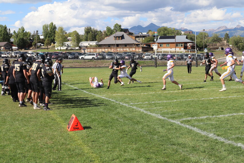 Pirate running back Hudson Mazur fights through multiple Basalt defenders to earn additional yards. Mazur ended the game with a total of 153 rushing yards as the Pirates took down the Longhorns by a score of 21-16 on Saturday, Sept. 26.