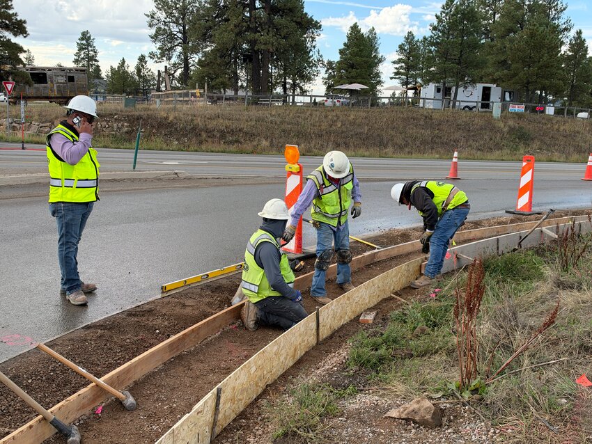 Crews set forms at the intersection of Piedra Road and Harman Park Drive as they prepare to pour new concrete curb and gutter and sidewalks.