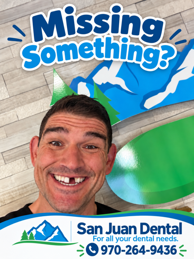 Dr. Eric Smith of San Juan Dental shows off a temporary &ldquo;gap&rdquo; to prove a point: missing teeth can happen to anyone, but dental implants offer a natural, lasting solution for your smile.