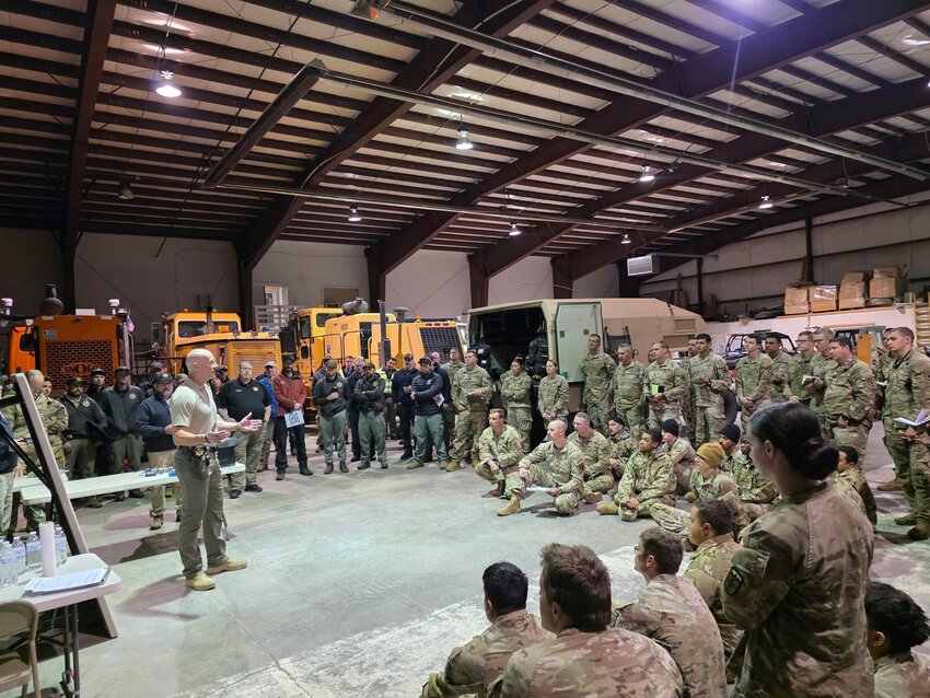 Archuleta County Sheriff Mike Le Roux addresses members of the Colorado National Guard deployed to the area.