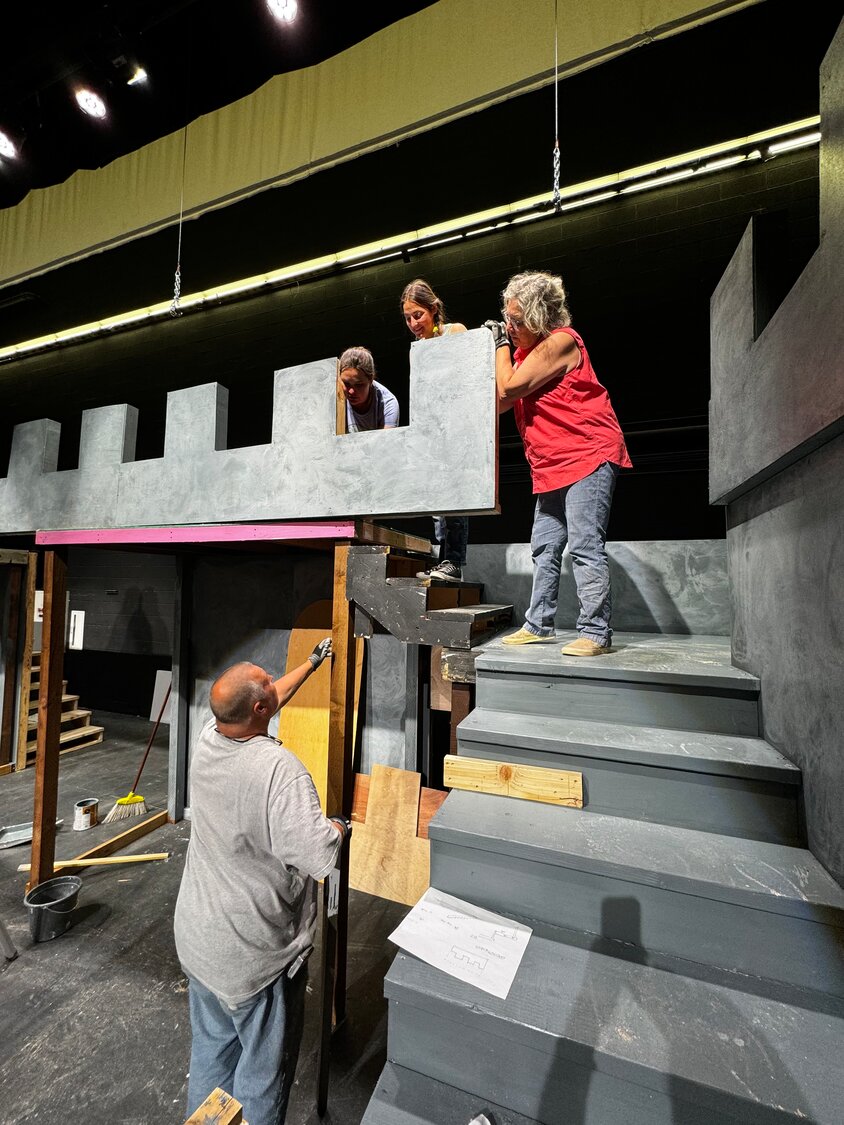 Crew members work to bring the set of “Once Upon A Mattress” to life ahead of its opening on June 12. Performances are set for 7 p.m. June 13-15 and 2 p.m. on June 16.