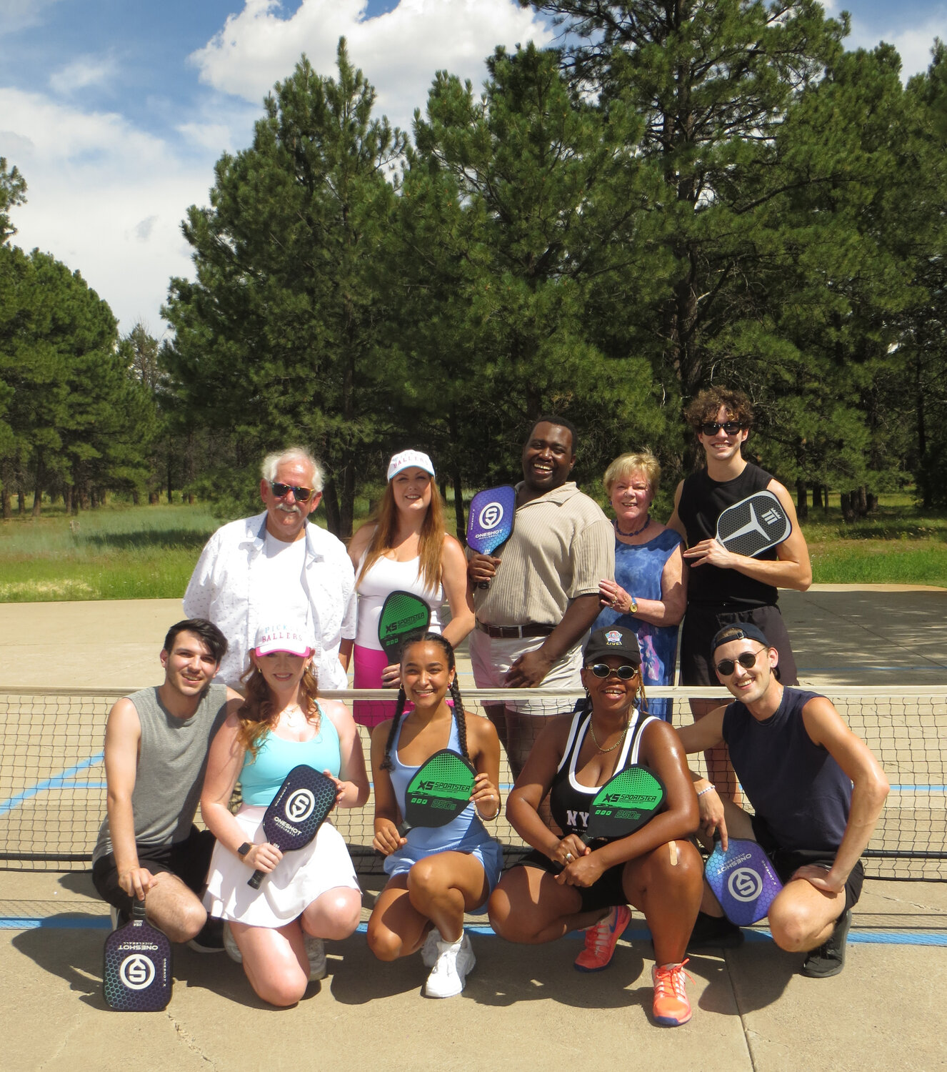 Thingamajig Theatre Company actors competed in the second annual Bob Howard Memorial Pickleball Tournament Aug. 5 in honor of Howard, a longtime theater patron who died in October 2022, two weeks after his 80th birthday. He was an active member of the Pagosa aviation community, having owned 13 planes and two gliders during his lifetime, and also a member of the Gray Wolf Ski Club and Pagosa Springs Golf Club. Two-person mixed doubles tournament teams were created by a random card drawing. The tournament director was Kate Alfred and the scorekeeper was actor/director Dennis Elkins. The winners were Nyla Eltahir and Keenan Pasqua. Host Carole Howard is standing second from the right.